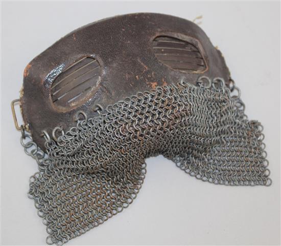 A WWI leather and chainmail tank mask, 7in.